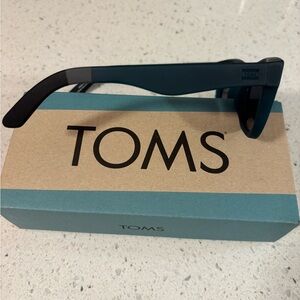 Toms brand Paloma Traveler sunglasses.